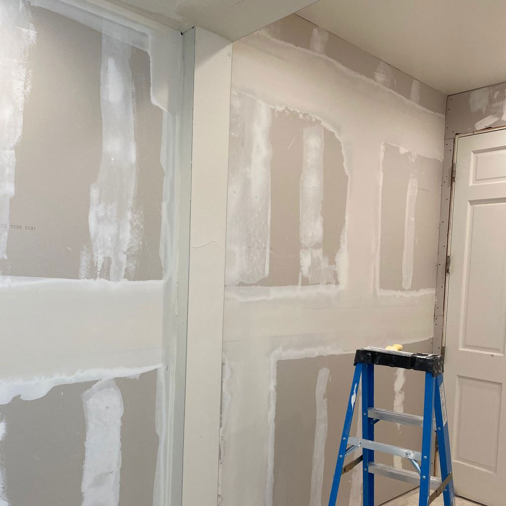 Finished interior wall after drywall repair and paint